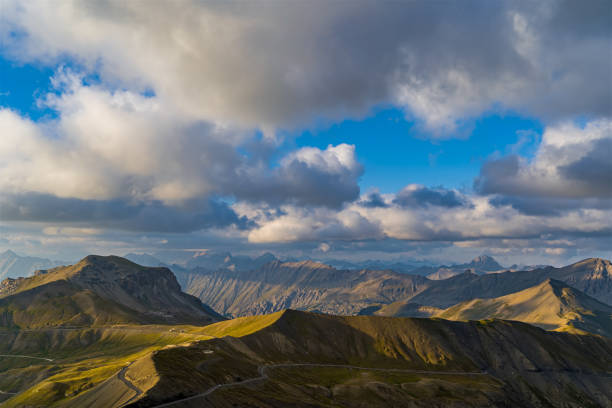 istock Clouds Moving Fast Over French Alps Mountains Peaks 1386216499