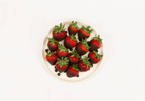 istock chocolate strawberries on a plate on a white background 1386218121