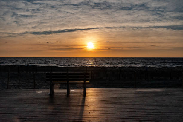 Early morning after sunrise, a neat, clean city promenade on the Maltese coast.