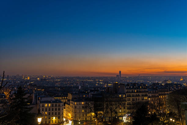 Timelapse - Blue Hour Over Paris Rooftops From Sacred Heart Basilica at Sunset. Find more images of PARIS on my profile.