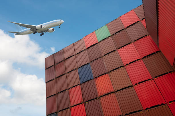 istock Industrial container yard for logistics business and transport aircraft, import, export 1386228602