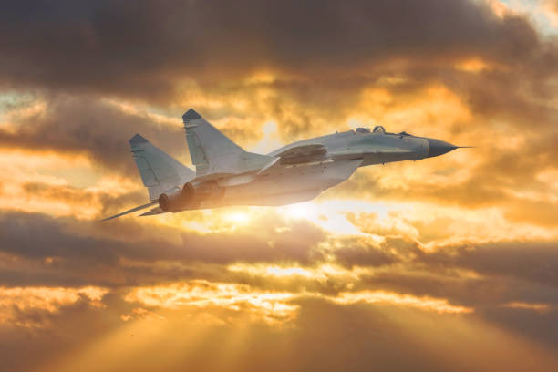 istock Rapidly taking off combat fighter in the air. 1386232272
