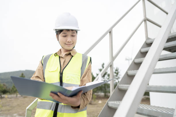 istock A young Asian woman engineer working on wind energy. 1386237039