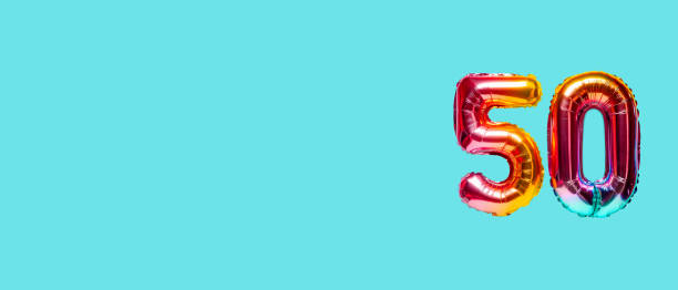 istock Rainbow foil balloon number. Top view. 1386239998