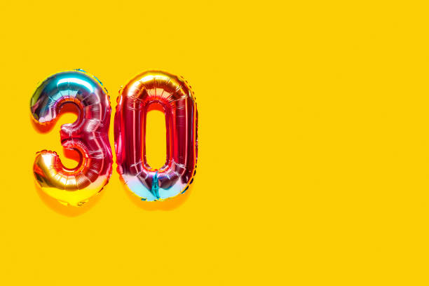 istock Rainbow foil balloon number. Top view. 1386240986