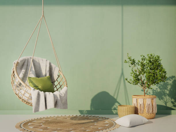 吊り椅子、植物、籐の鉢と敷物が付いている緑の壁.3dレンダリング
