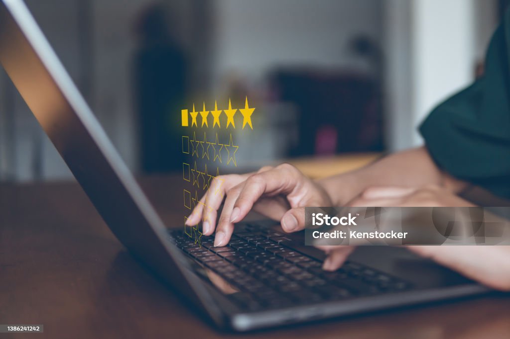 Customer review satisfaction feedback survey concept, rating service experience on online application. Feedback Stock Photo