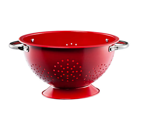 istock Stainless steel red colander isolated on white background 1386241355