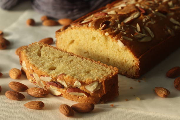 istock Ghee cake slice. Vanilla flavoured ghee cake with almonds on top. The perfect accompaniment for a cup of coffee. 1386250393