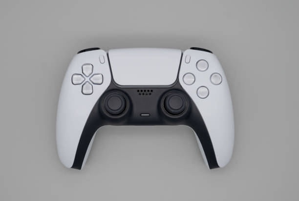 controller di gioco di nuova generazione su sfondo grigio chiaro - video game joystick leisure games control foto e immagini stock
