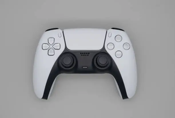 Photo of Next Generation Game Controller On Plain Grey Background