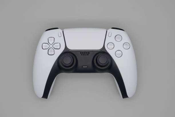 next generation game controller on plain grey background - joystick gamepad control joypad imagens e fotografias de stock