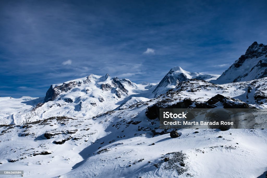 Monte Rosa View of the Alpine range surrounding Zermatt with the Monte Rosa Glacier Stock Photo