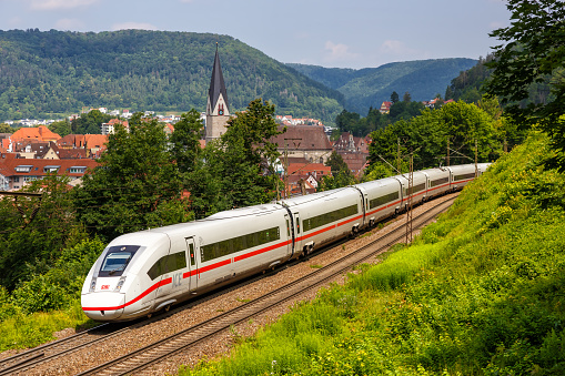Geislingen, Germany - July 21, 2021: ICE 4 high-speed train of Deutsche Bahn on Geislinger Steige near Geislingen, Germany.
