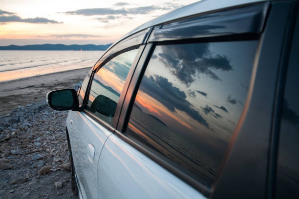 istock Twilight sky reflect on mirror car door 1386273171