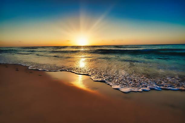 istock Mexico beach sunrise at ocean 1386273720