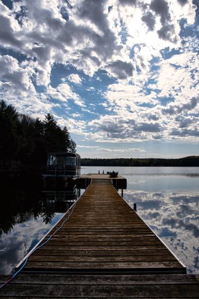 istock Cottage living pontoon boat 1386275048