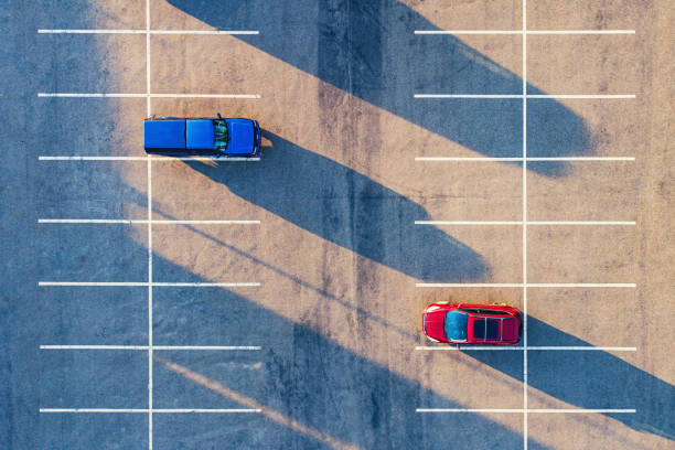 Long Shadows In Parking Lot stock photo