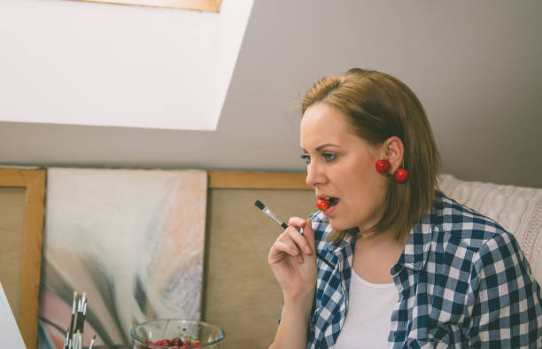 istock Beautiful female artist 1386281421