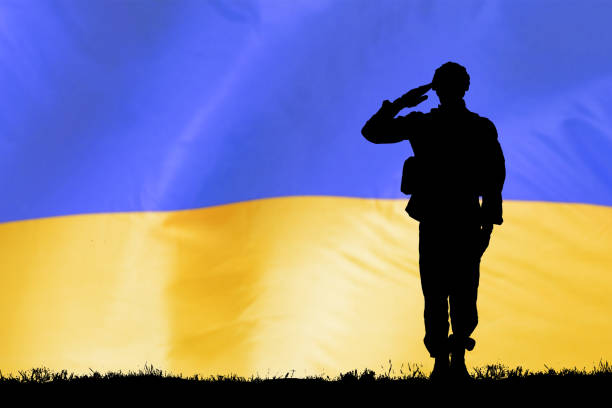 istock Solider Silhouette With American Flag 1386283056