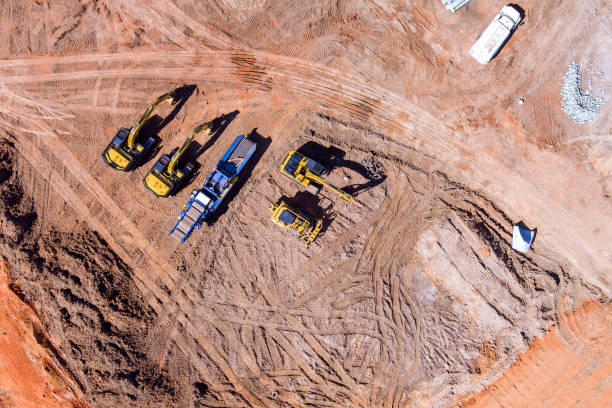 istock Heavy tractor machinery excavator align the earth doing landscaping 1386286142