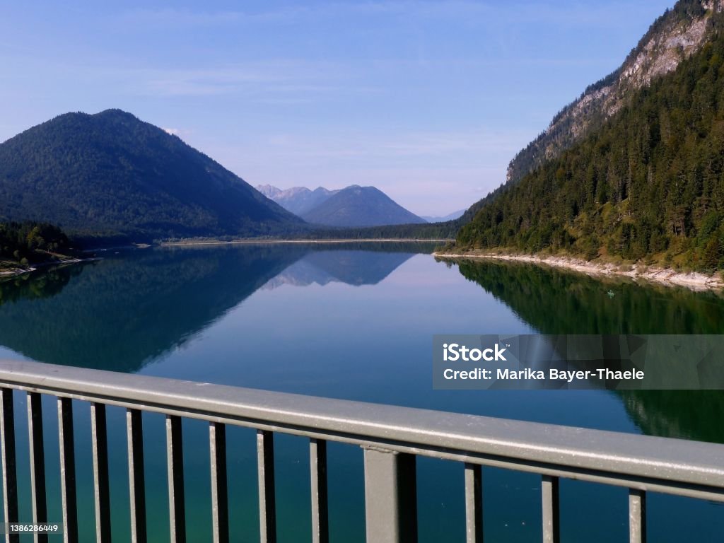 Bavaria, Upper Bavaria, Sylvensteinspeicher View from the dam. Beautiful reflections. Beauty In Nature Stock Photo