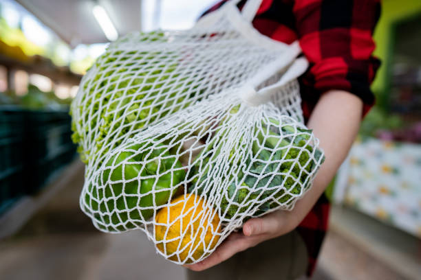 istock Shopping with reusable bag 1386289409