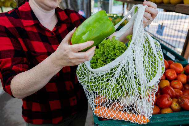 istock Shopping with reusable bag 1386289443
