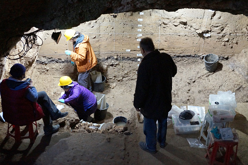 Gabrovo, Bulgaria - September, 25, 2021: archaeologists excavate in the Bacho Kiro cave