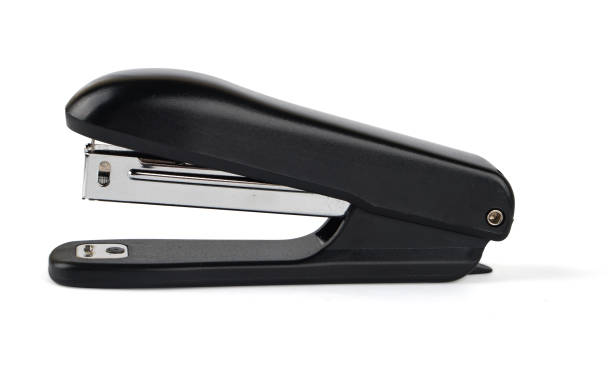 istock stapler for stapling paper with shadow, on a white background in isolation 1386299837