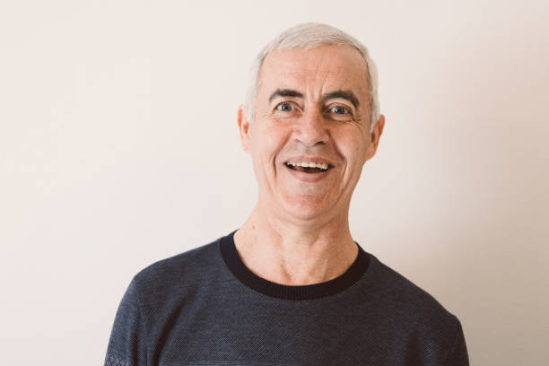 istock Characterful faces of a mature man 1386306668