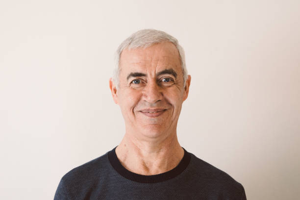 istock Characterful faces of a mature man 1386306883