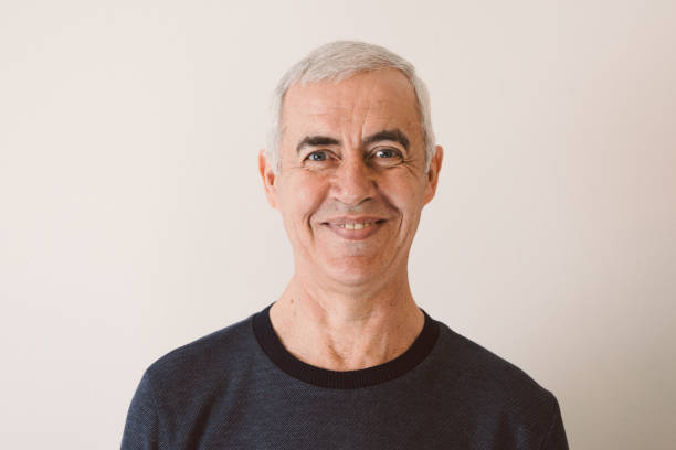 istock Characterful faces of a mature man 1386307488