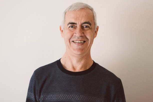 istock Characterful faces of a mature man 1386307592
