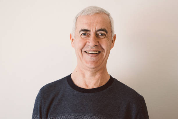 istock Characterful faces of a mature man 1386307657