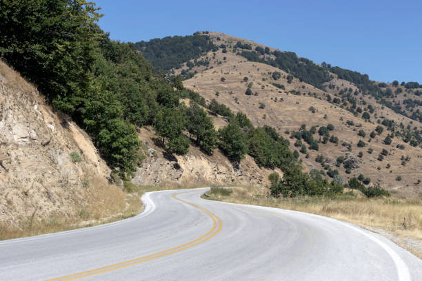 istock Road in the mountains (northwest Greece, Macedonia) 1386308610