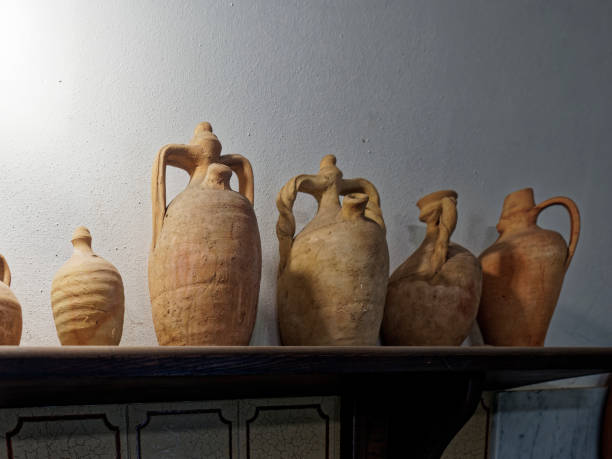 istock historical amphoras are kept on top a wooden table 1386315339