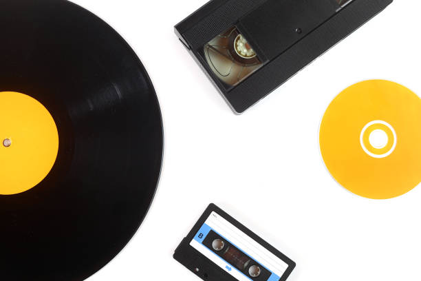 istock Vinyl record, cd, audio and video cassettes top view 1386317926