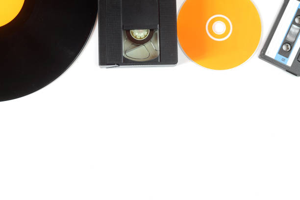 istock Vinyl record, cd, audio and video cassettes top view 1386317942