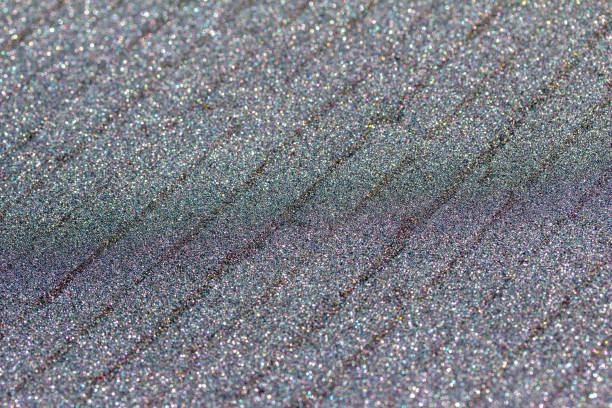 istock Macro abstract texture background of sparkling silver glitter with brick design 1386321136