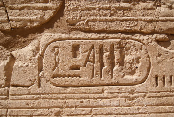 istock Ancient Egyptian writing, Egyptian hieroglyphs, wall inscriptions 1386324601