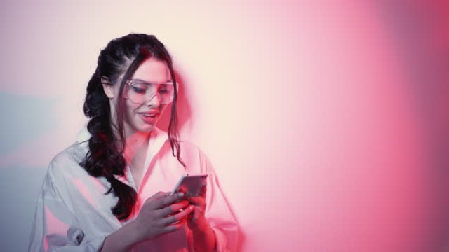gadget lifestyle social media woman phone neon