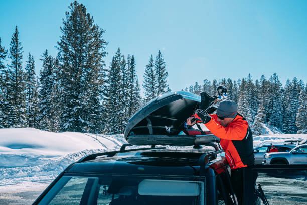 istock Wide Angle Copy Space Shot of a Man Digging in His Vehicle's Rooftop Rack Getting Ready for a Day of Cross-Country Nordic Skiing in the Grand Mesa National Forest in Colorado 1386353448