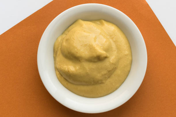 그릇에 노란색 겨자 - mustard bowl isolated condiment 뉴스 사진 이미지