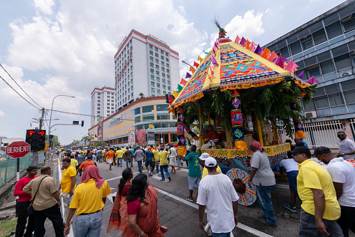 Bukit Mertajam, Penang, Malaysia - Mar 21 2019: Indian pull the chariot at street near Bukit Mertajam Plaza.