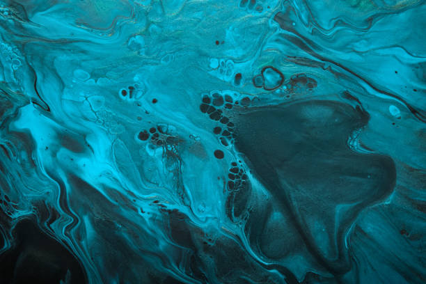 istock Fluid Art. Blue abstract wave swirls on black background. Marble effect background or texture 1386376804
