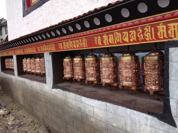 enjoy  trekking in nepal enjoy  trekking in nepal buddhist prayer wheel stock pictures, royalty-free photos & images
