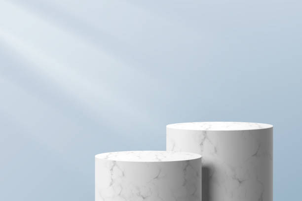 istock Realistic 3D white marbles cylinder stand or podium group in abstract light blue room. Luxury minimal scene for products stage showcase, promotion display. Vector geometric platform. Studio room. 1386391869