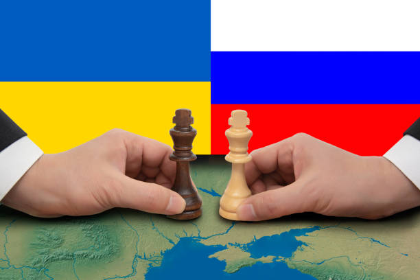 Ukraine-Russia Summit expressed in a chess game. Ukraine-Russia Summit expressed in a chess game. 2022 russian invasion of ukraine stock pictures, royalty-free photos & images