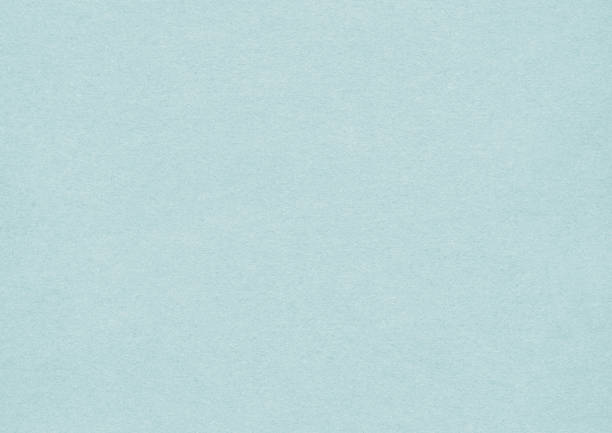 istock Light blue color paper texture for background 1386396458